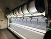 High-precision split warping machine for textile manufacturing