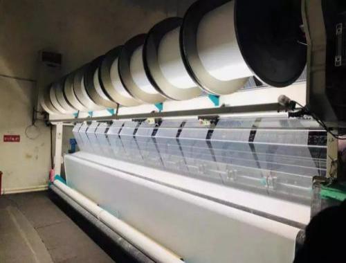 High-precision split warping machine for textile manufacturing